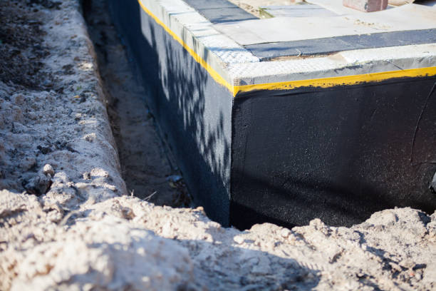 Professional Waterproofing technician working in McCordsville, IN